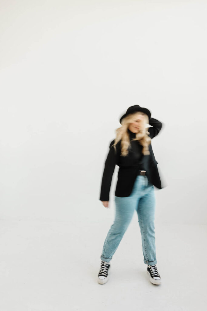 Australian photographer personal branding photography session sydney posing for a blurred image of herself 